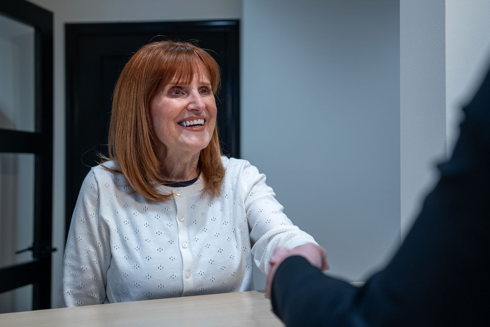 woman shaking on job well done